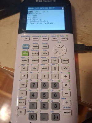 Graphic calculator TI-83 Premium CE used, battery needs replacement