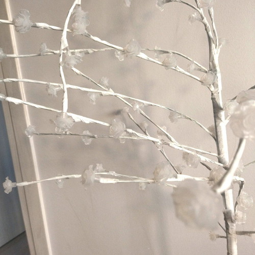 Decorative tree with roses used with lights and metal base