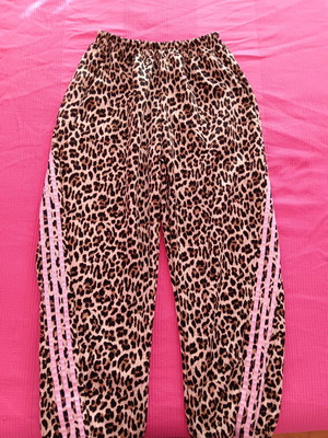 Leopard pants like new, size XL, black and brown