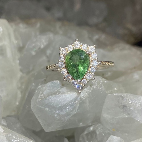Silver ring with natural green tourmaline and moissanite