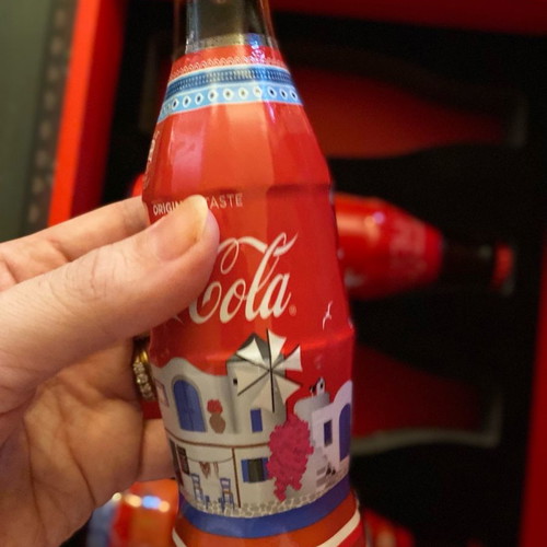 Collectible bottles and book 50 years Coca Cola new
