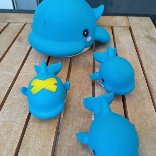 Baby bath toys used, pack with mama and baby whales