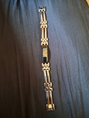 Bracelet in grey color, new