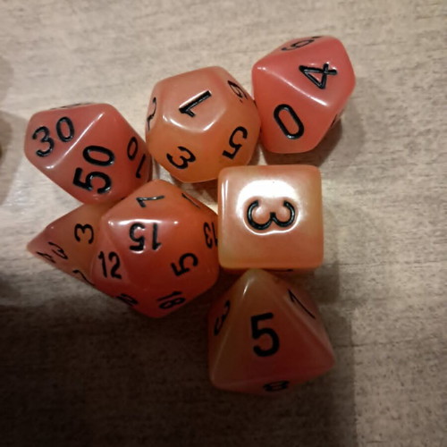5 sets of glow in the dark D&D dice