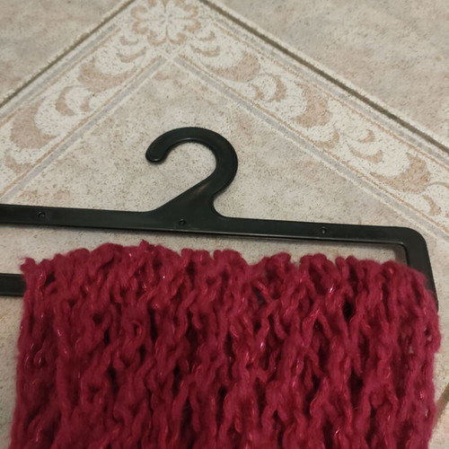 Knitted scarf used color magenta