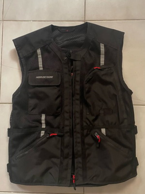Nordcode motorcycle vest small size like new, perforated with back protection