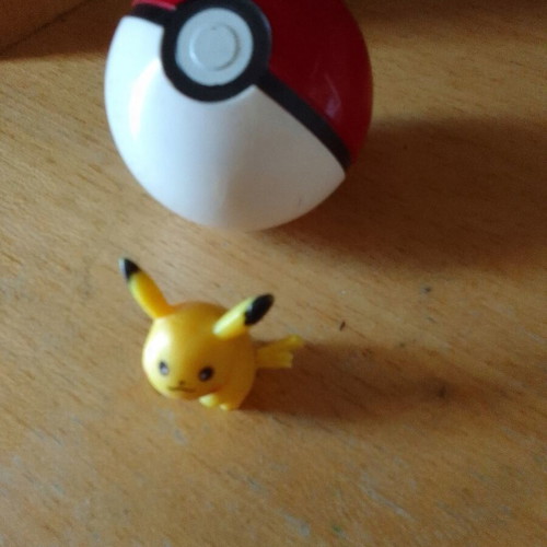 Pokémon ball with figure like new