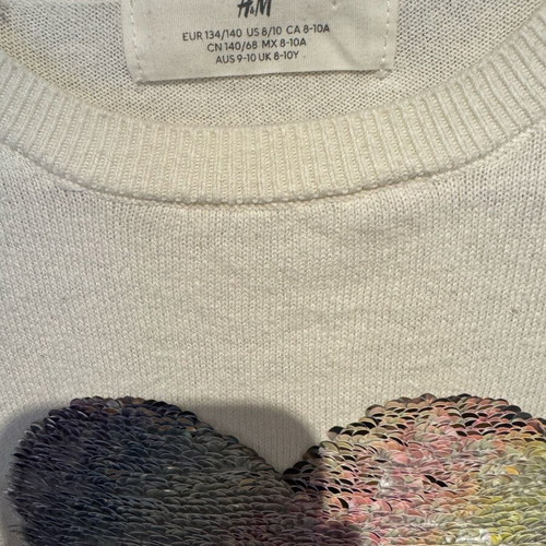 H&M white knitted sweater with color-changing sequin heart, like new