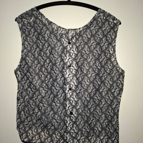 Sleeveless vest Medium with transparency and embroidered flowers like new