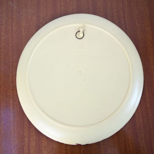 Vintage decorative wall plate with embossed male profile used