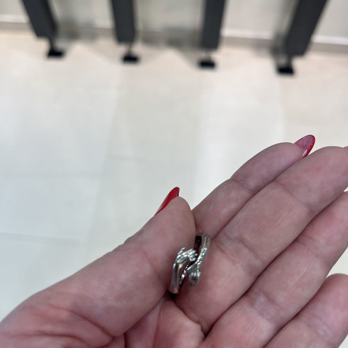 Steel ring silver color adjustable size with hands design like new