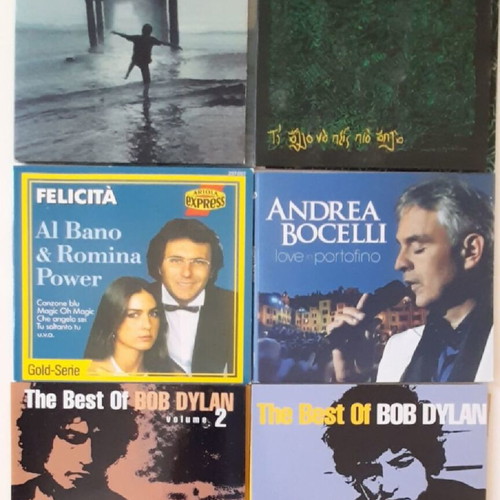 CDs with songs new, 2 Pyx Lax, 1 Al Bano & Romina Power, 2 Bob Dylan