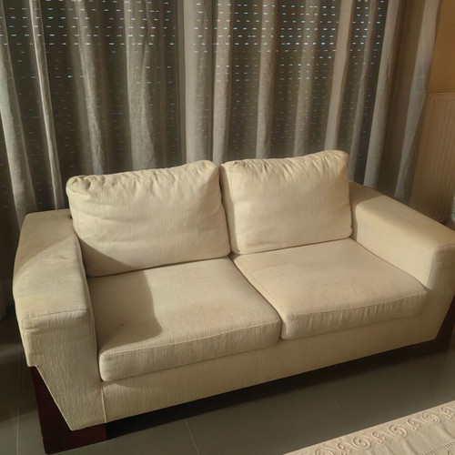Two-seater sofa used, made of solid wood