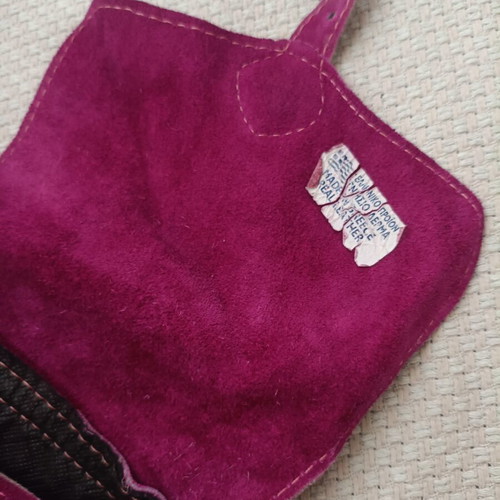 Leather backpack fuchsia used with some wear