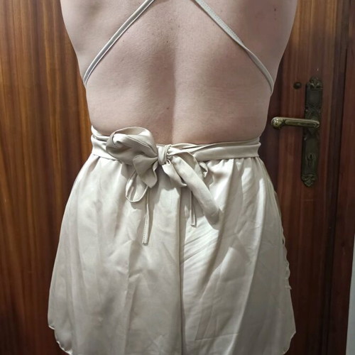 One-piece mini romper like new, gold with crisscross back