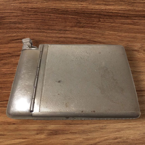 Vintage cigarette case with lighter used