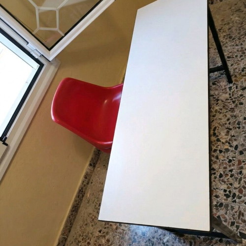 Desk with chairs used, ideal for tutoring centers