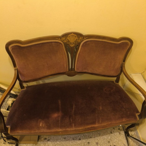 Vintage two-seater sofa used with mosaic details