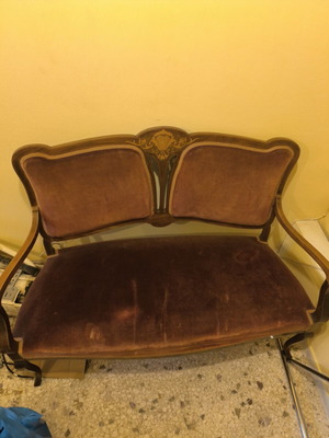 Vintage two-seater sofa used with mosaic details
