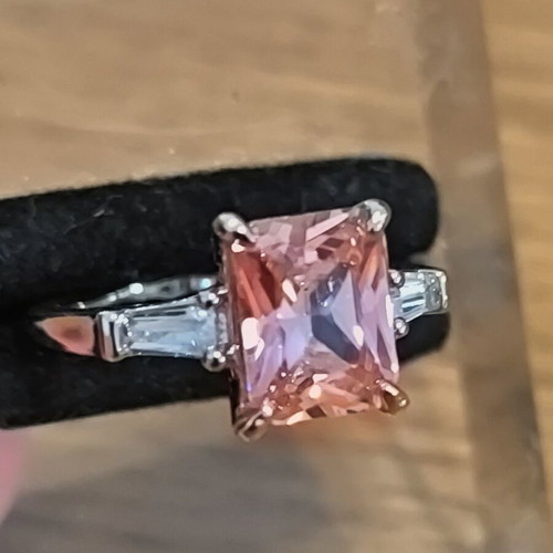 Ring with pink rectangular zircon and silver plating
