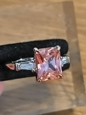 Ring with pink rectangular zircon and silver plating