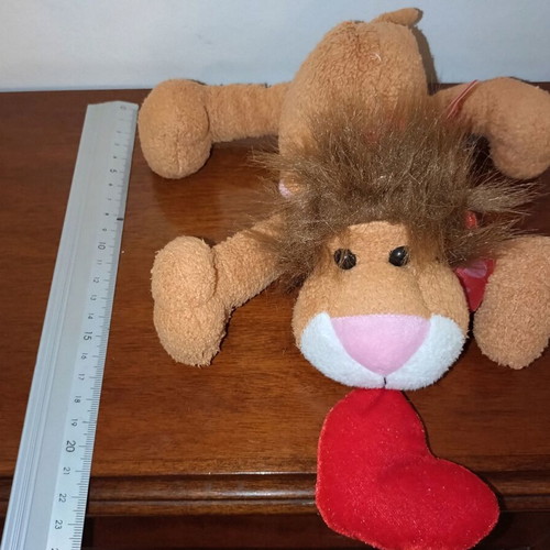 Plush lion cub used stuffed toy