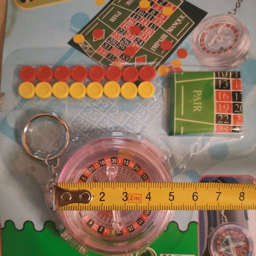 Mini roulette keychain new, sealed package