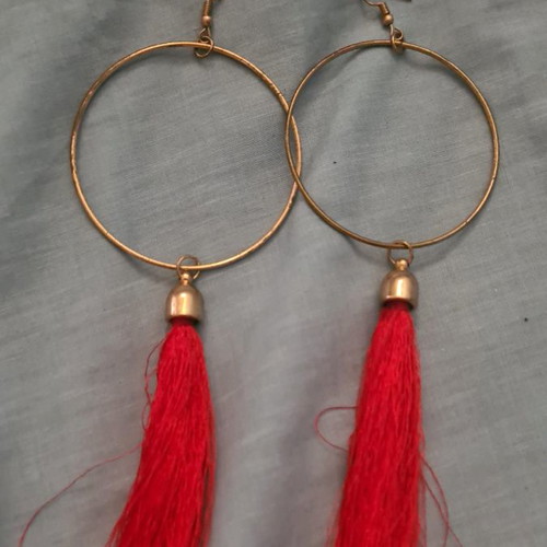 Hoop earrings used with red detail