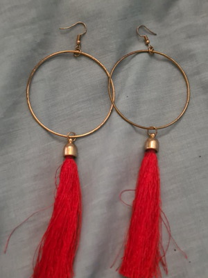 Hoop earrings used with red detail