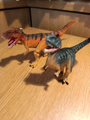 Set of two dinosaur-themed assembly toys like new
