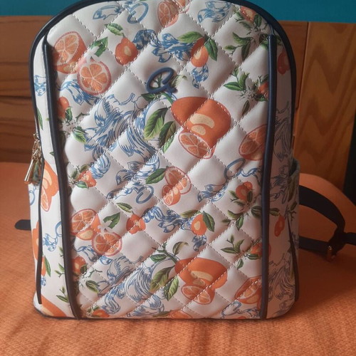 Axel backpack with quilted texture and citrus pattern, like new