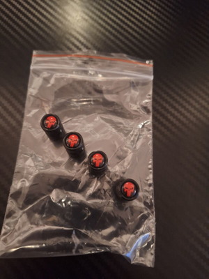 Punisher valve caps carbon black with red detail, like new, set of 4
