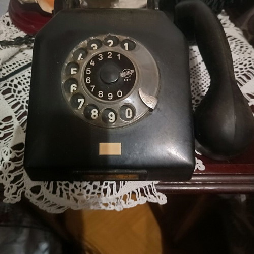 Vintage telephone device refurbished, black, wired, made in Germany