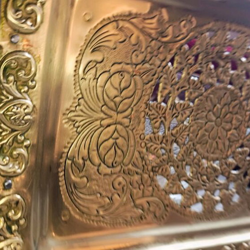 Old Bronze Plate with Relief Designs – Collectible Piece