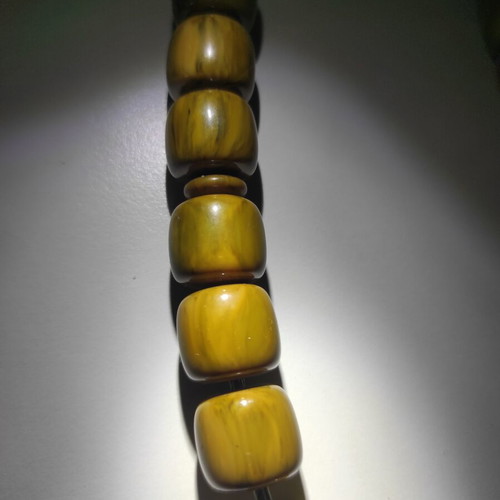 Mastic komboloi with yellow green shades