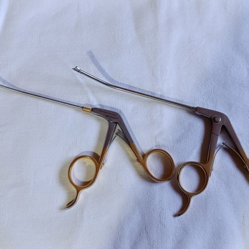 Surgical instruments used, stainless steel with gold-plated handles