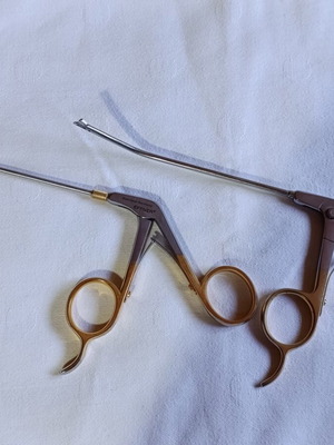 Surgical instruments used, stainless steel with gold-plated handles