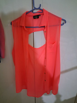 Shirt like new, orange sleeveless blouse