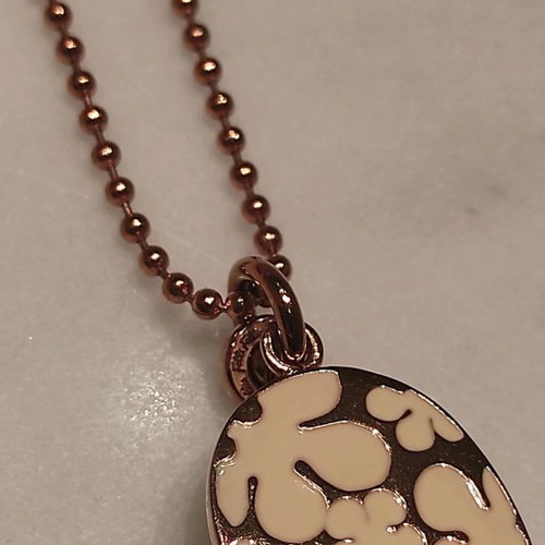 Folli Follie necklace used pink gold plated oval cross with floral design