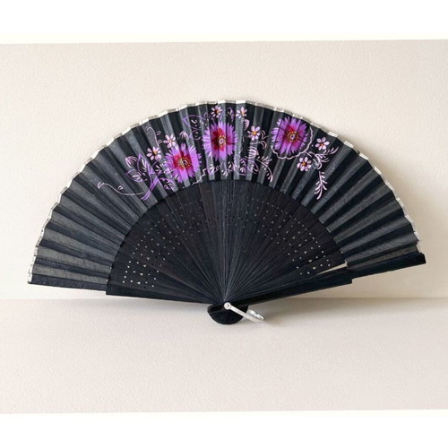 Handpainted fan used, black with floral design, wood and textile