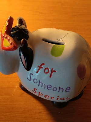 Ceramic cow piggy bank like new decorative