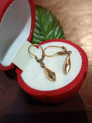 Gold women's earrings 23 carat, like new