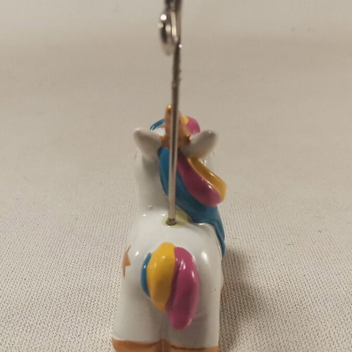 Table stand with unicorn design and metal clip