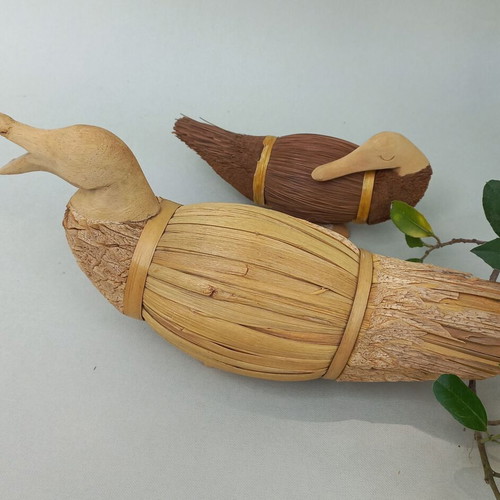 Set of handmade decorative wicker ducks used