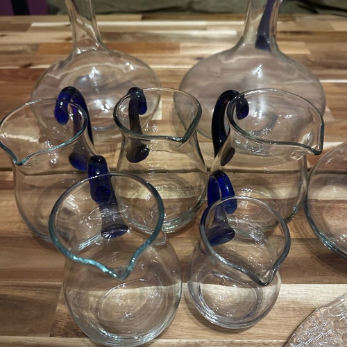 Set of 10 blown glass pitchers like new with cheese platter