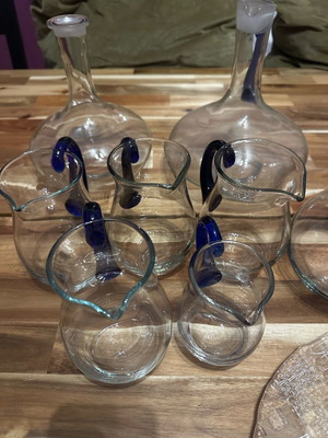 Set of 10 blown glass pitchers like new with cheese platter