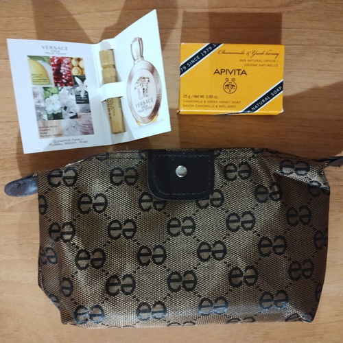 Mini toiletry set with brown-gold cosmetic bag, Apivita soap, Versace Eros Pour Femme sample
