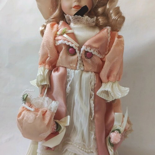 Porcelain dolls used, set of 2 with clothes and accessories