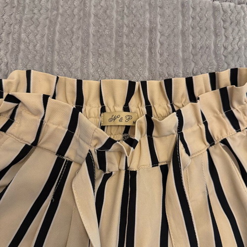 Beige striped high-waisted pants used, size M