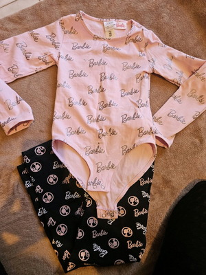 Barbie set used for 5-6 years with small hole on bodysuit